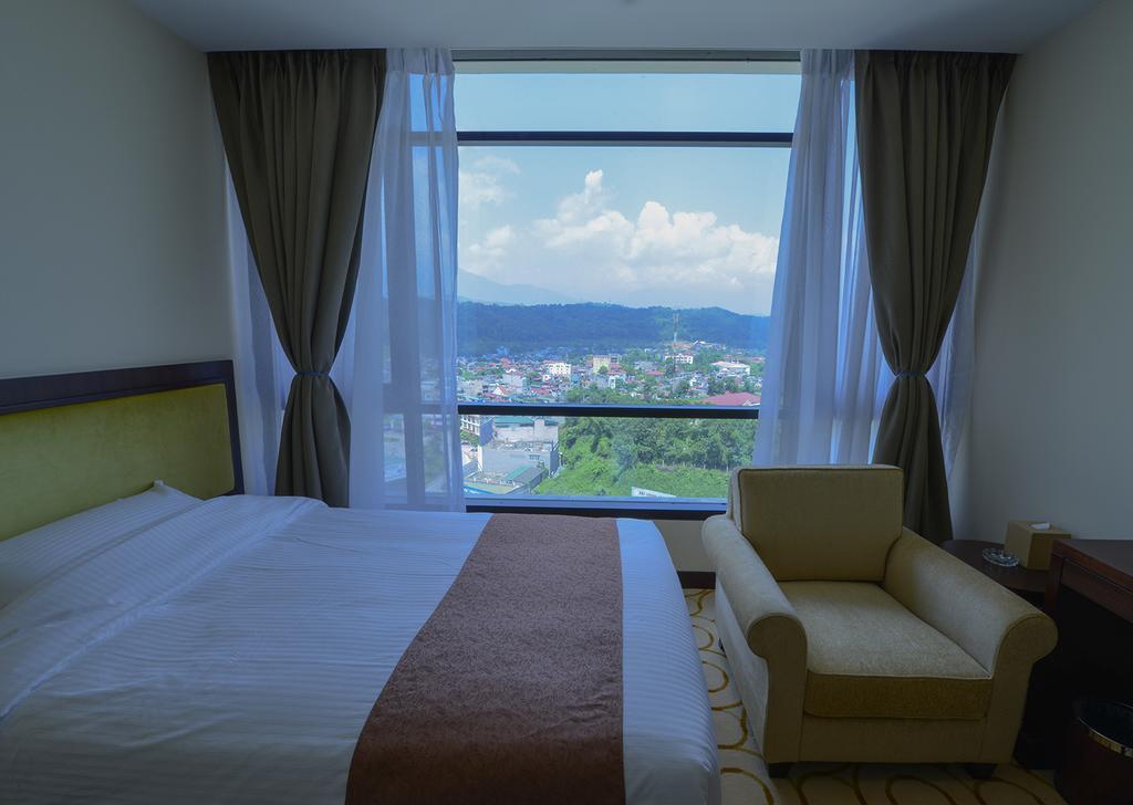 Aristo International Hotel Lao Cai Quarto foto